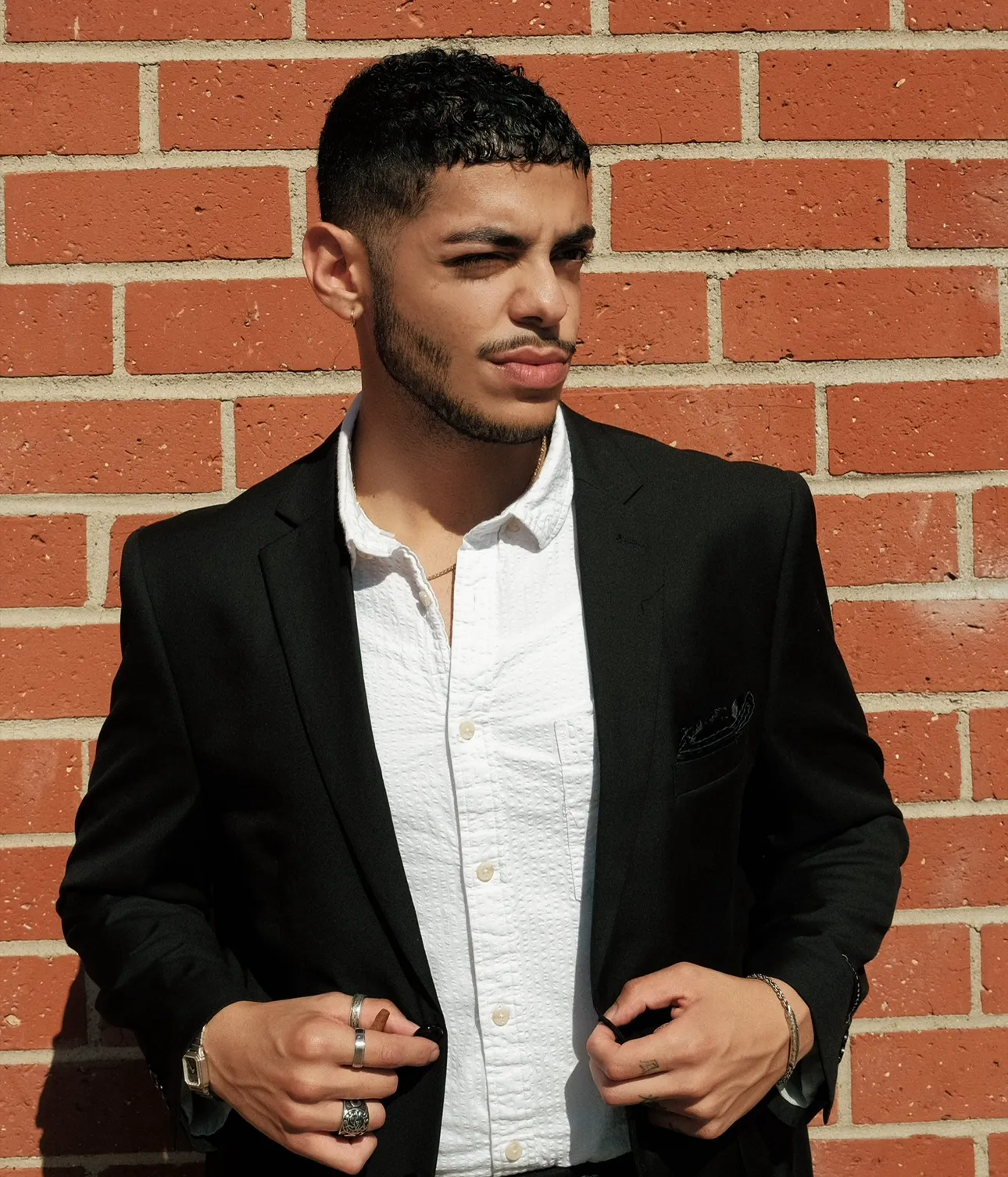 Kaz in a black blazer